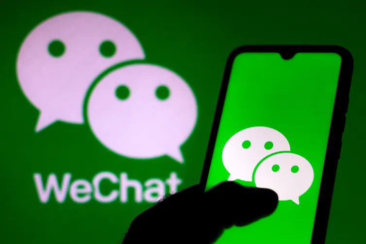 A mobile phone showing the WeChat logo.