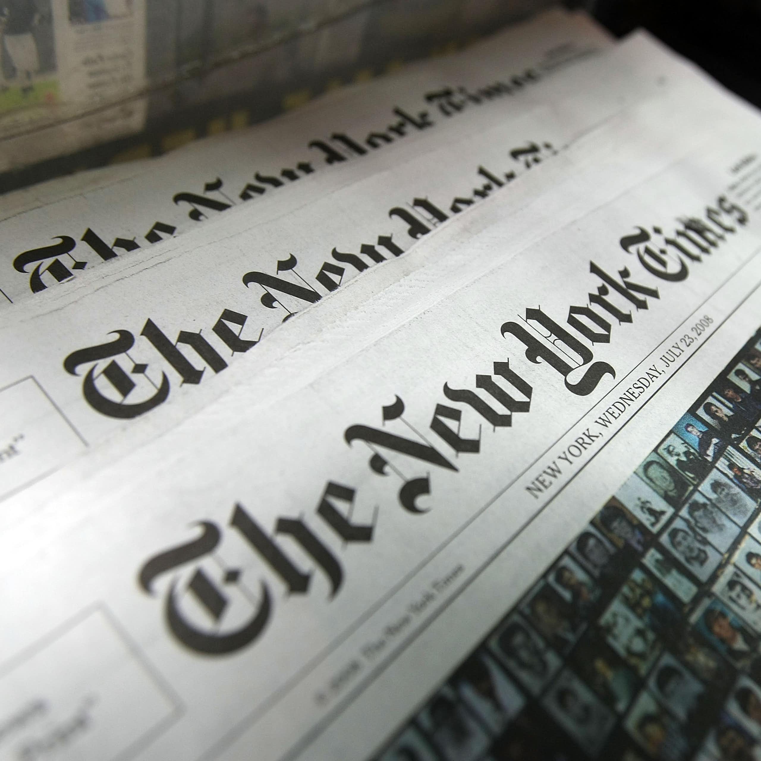 Copies of the New York Times sit for sale in a rack in New York City.