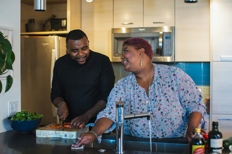 Couple cook together