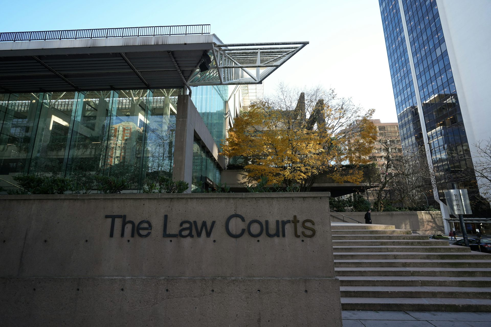 Exterior shot of a building with the lettering 'The Law Courts' and steps leading up to it