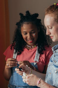 Girls compare nailpolish