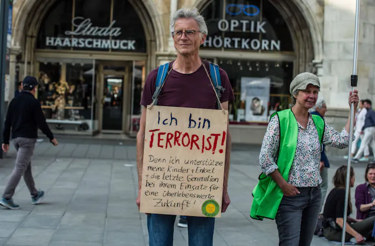 Man holding sign