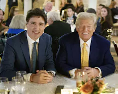 Donald Trump et Justin Trudeau, tout sourire, à table