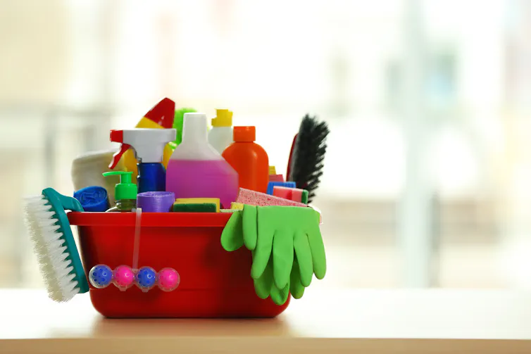 A tub of cleaning supplies.