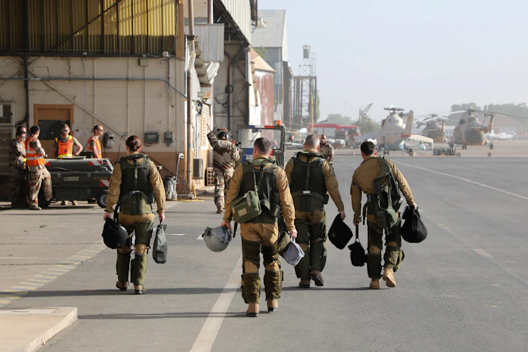 Men in military uniform at a military base