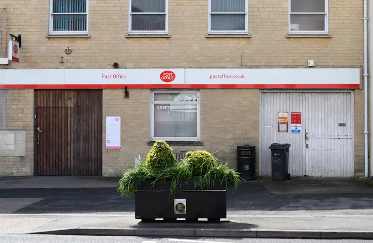 The outside of a closed post office.