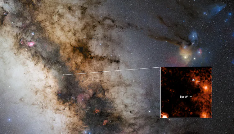 A bright galaxy overlaid with a cutout of a red and black image of a binary star system.