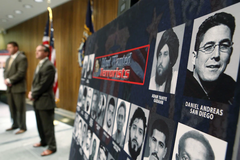 A 'Most Wanted Terrorists' poster shown at a press conference.