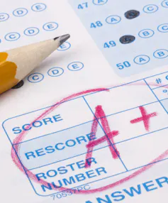 Close-up photograph of a perfect grade on a test