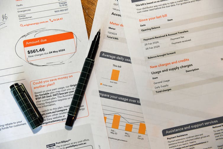 electricity bills and pen