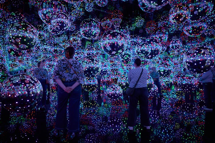 A room filled with silver orbs and lights.