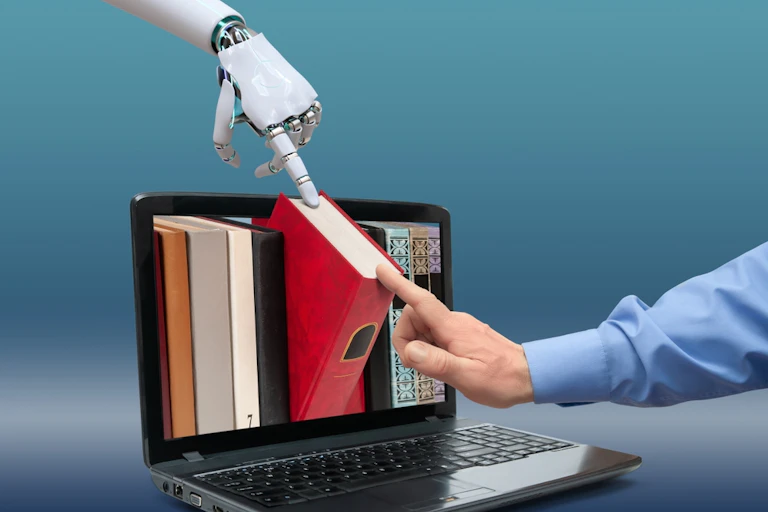 Ordinateur portable ouvert avec livres à l'écran