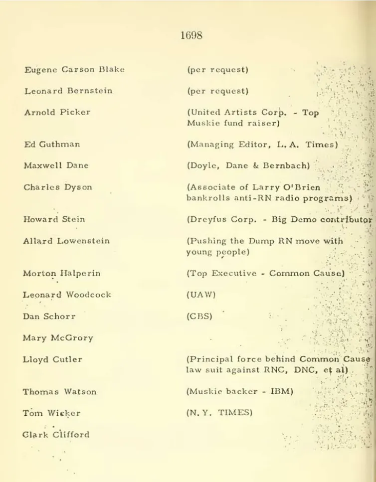 A yellow sheet of paper with typed names on it.