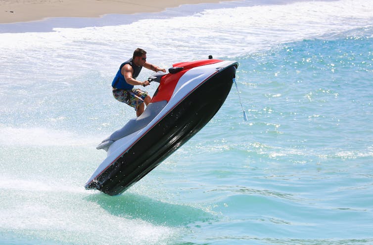 Man on jetski close to shore