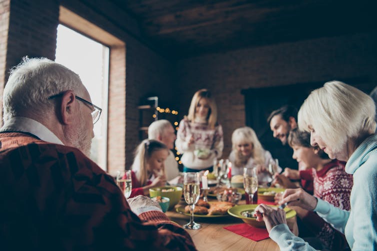 A family having a Christmas meal.