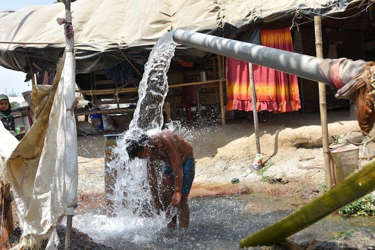 boy cooling down india