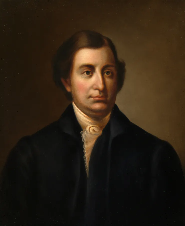 A formal portrait of a man with dark hair and colonial dress.