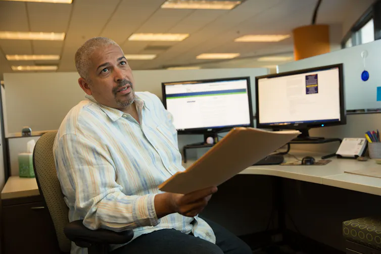 Office worker holds a file