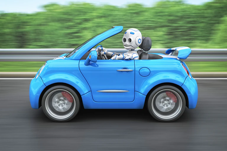 a robot drives a small convertible car on a road