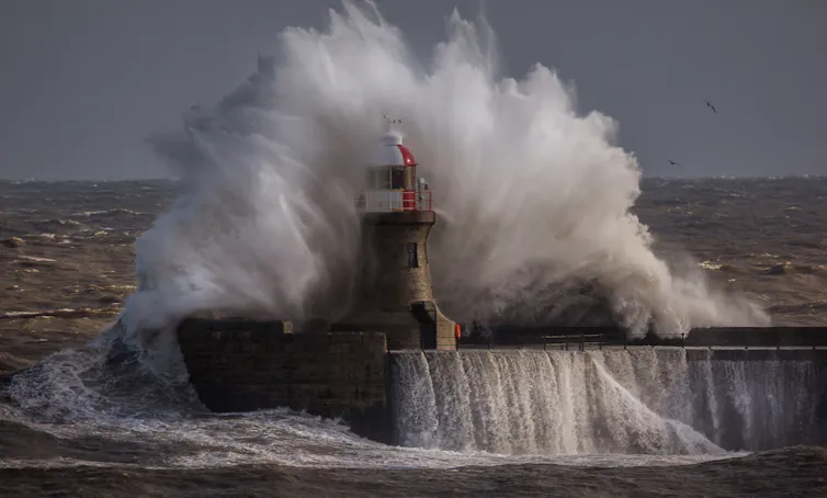 Waves against a lighthouse