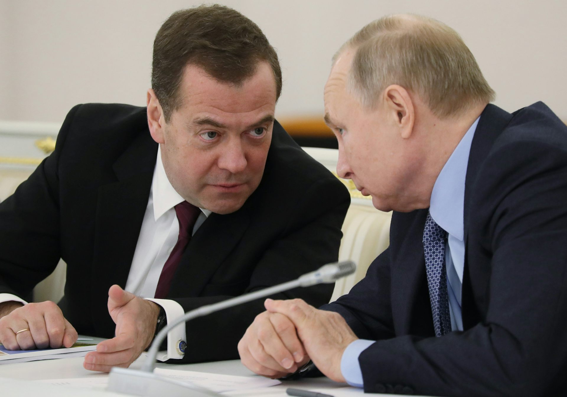 Dmitry Medvedev speaking with Vladimir Putin in 2019.