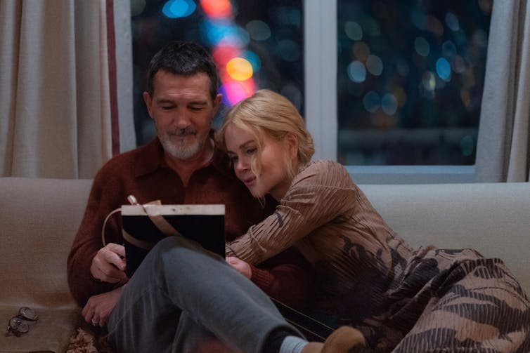 Nicole Kidman and Antonio Banderas sat together in their apartment.