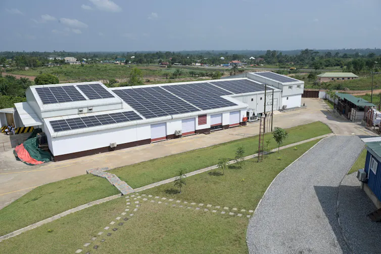 a cocoal processing plant in ghana with solar panels on its roof
