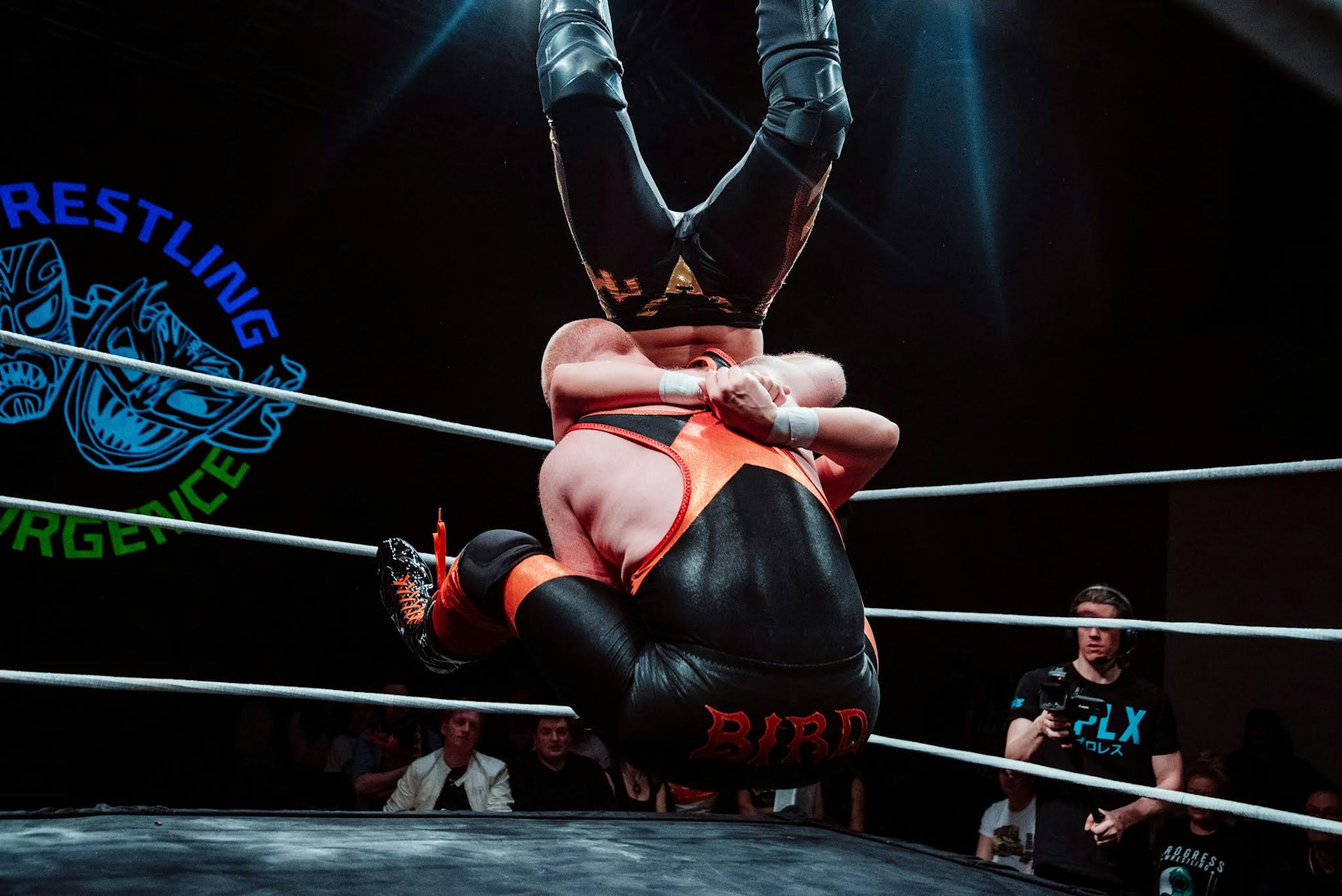Wrestlers in the ring.