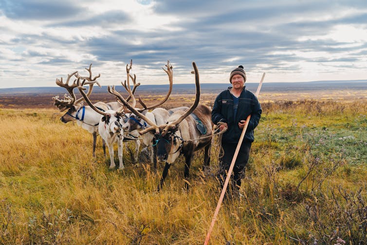 Man with reindeer