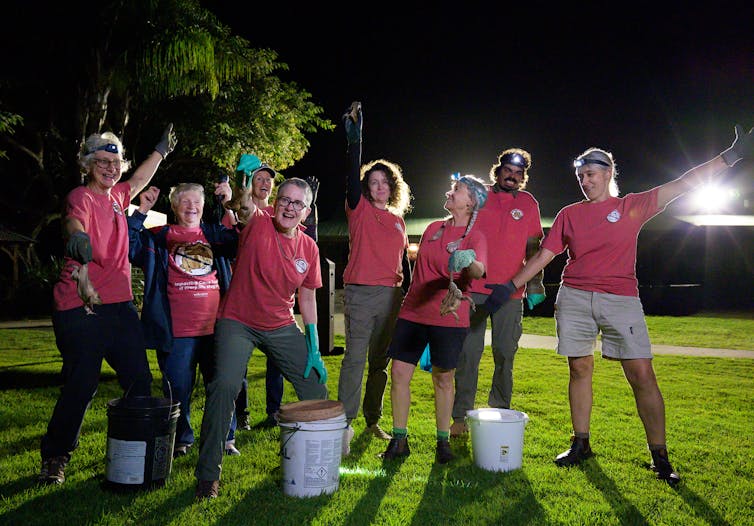 A group of women, triumphant.