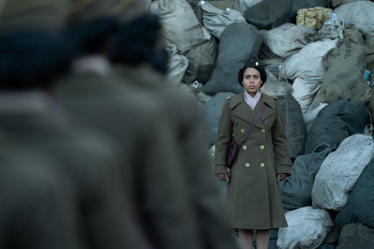 A woman in soldier's uniform