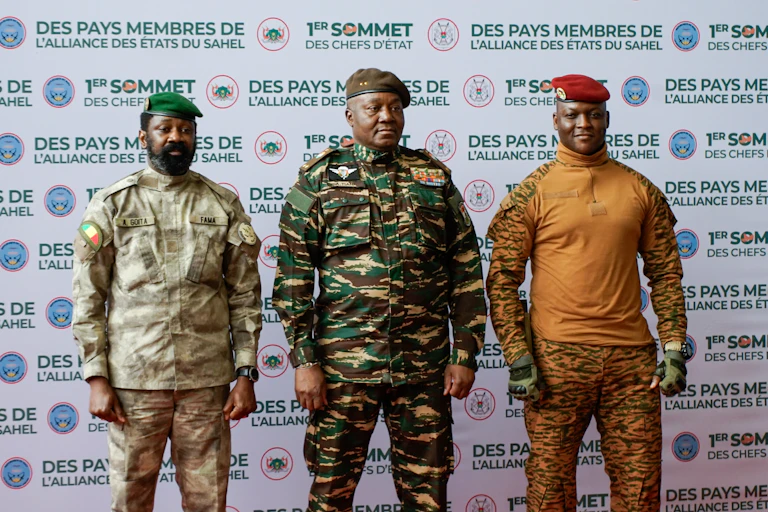 The junta leaders in Mali, Burkina Faso and Niger pose for photos.