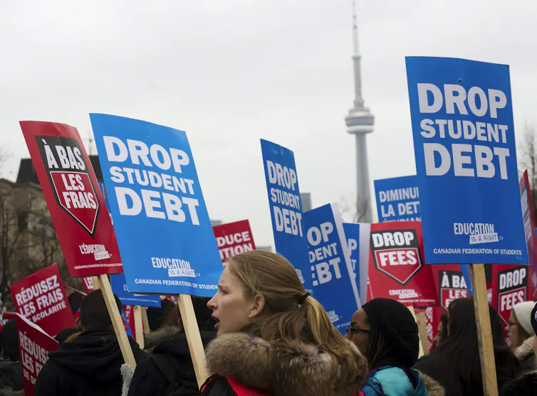 students seen at a tuition protest