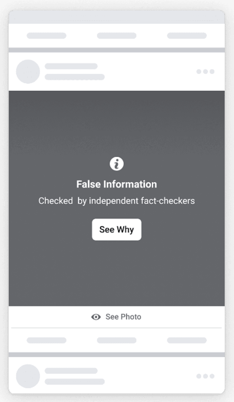 Screen showing a blurred post with the words 'False information' overlaid.