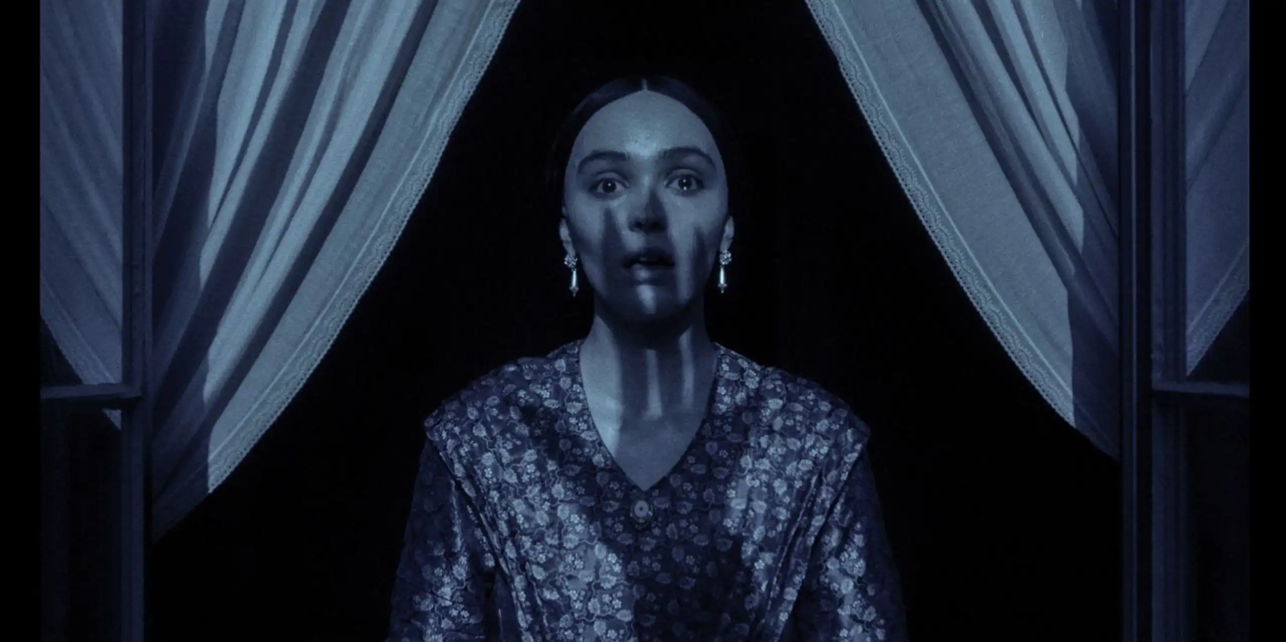 Ellen Hutter with the shadow of Nosferatu's hand on her