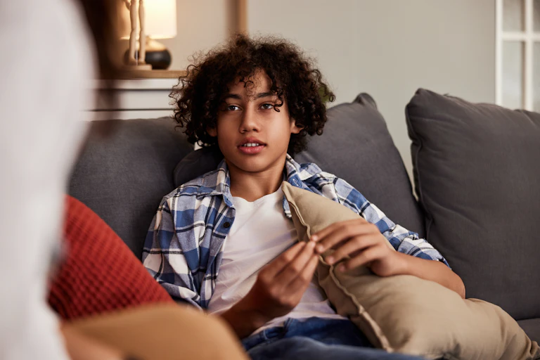 Teenage boy on sofa