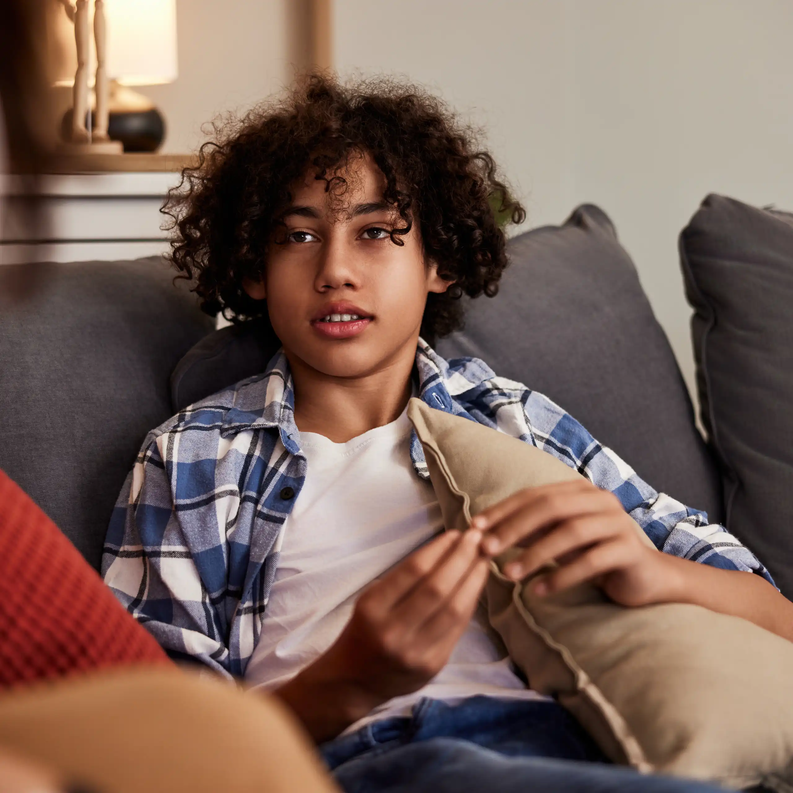 Teenage boy on sofa