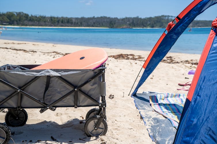 beach tent with cart on sand