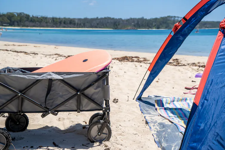 beach tent with cart on sand