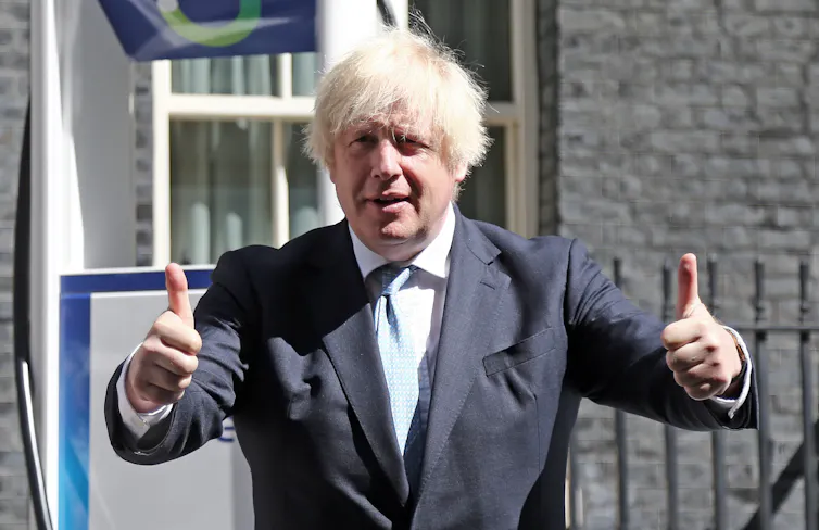 Boris Johnson giving double thumbs up