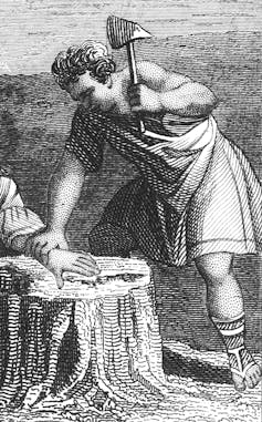 etching of man in toga about to chop off someone's hand on a tree stump