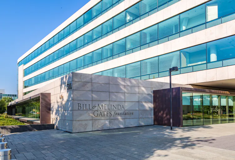 The headquarters of the Bill and Melinda Gates Foundation is a big building with a lot of windows.
