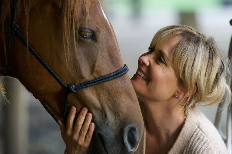 A woman and a horse