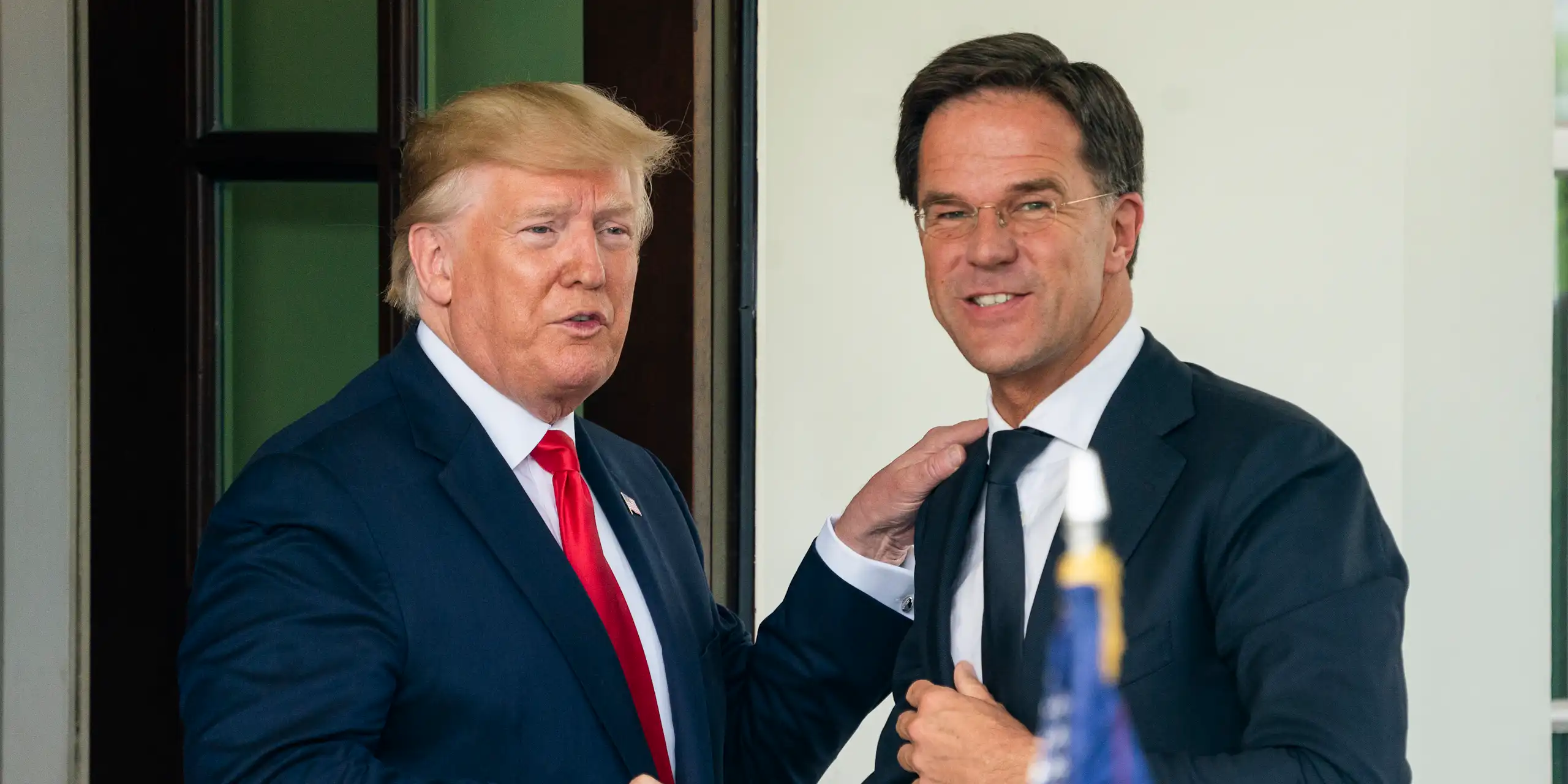 Donald Trump and Nato secretary-general Mark Rutte shaking hands in 2019.