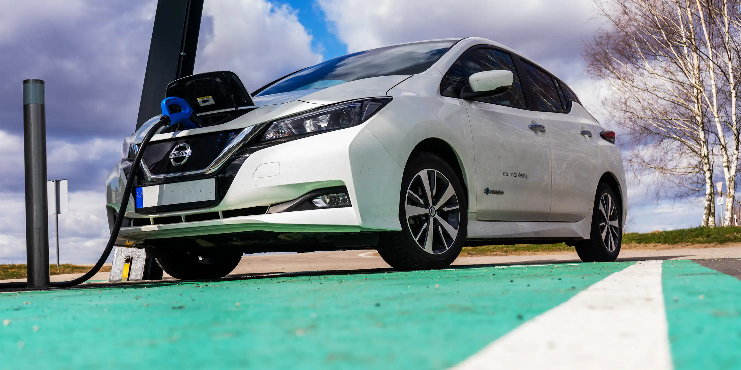 nissan ev plugged into a charging point