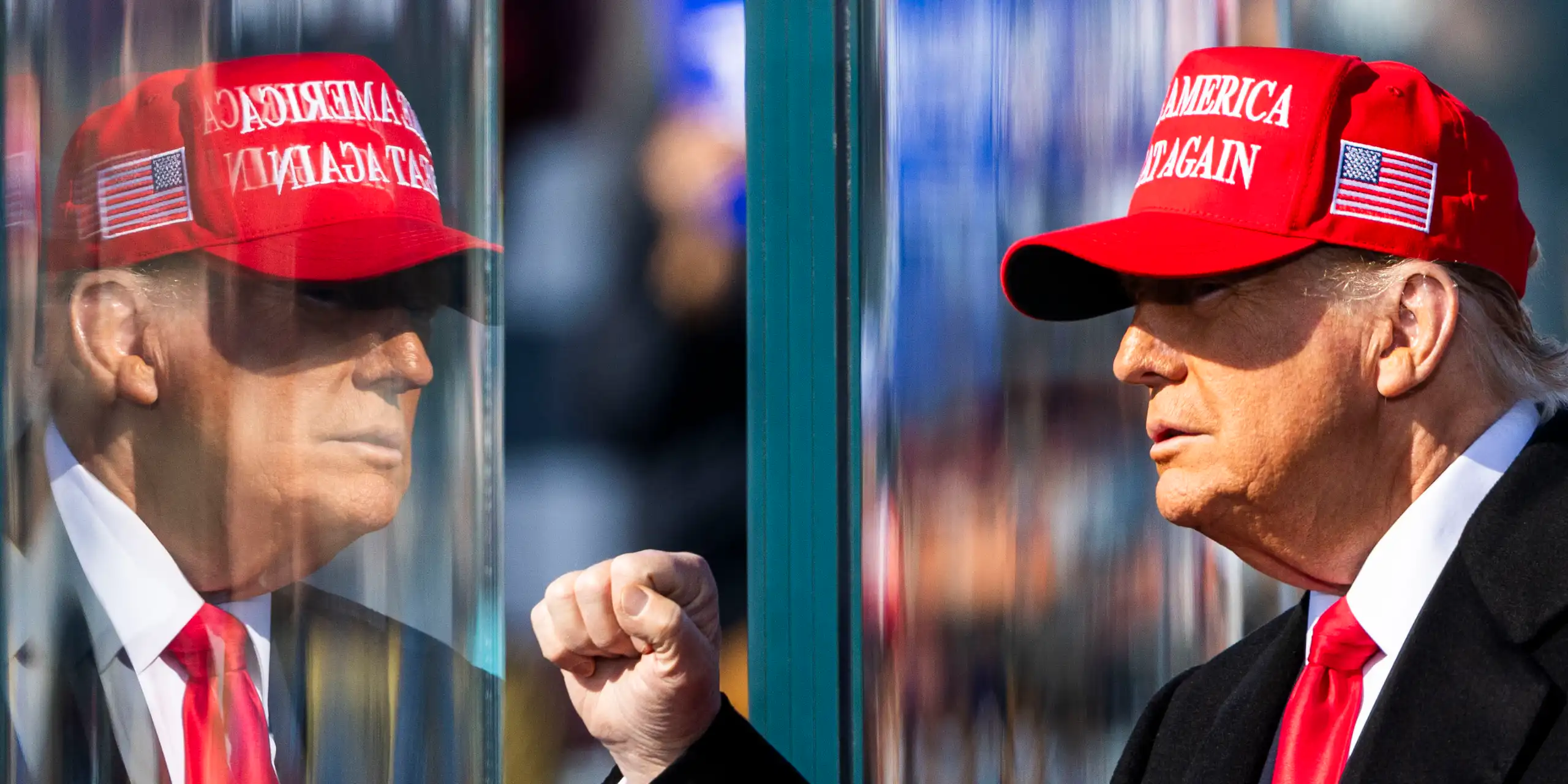 Donald Trump wearing a MAGA hat.