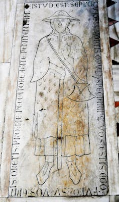 A sketch of a man on a white marble slab.