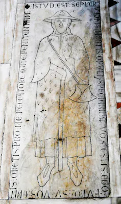 A sketch of a man on a white marble slab.