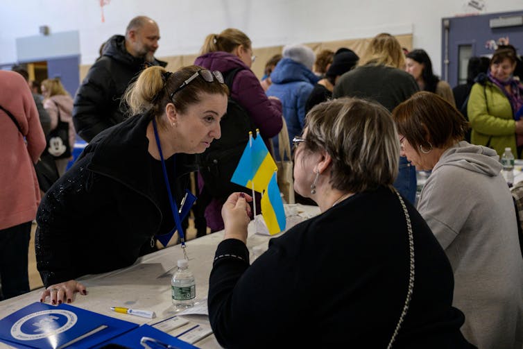 Ukrainian immigrants attend a job fair in New York City in February 2023. Angela Weiss/AFP via Getty Images Ukrainian immigrants attend a job fair in New York City in February 2023. Angela Weiss/AFP via Getty Images