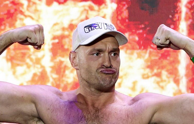Tyson Fury pouting in baseball cap.